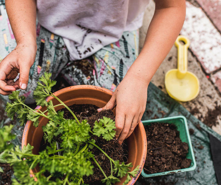 Happy Child Gardening child gardening
